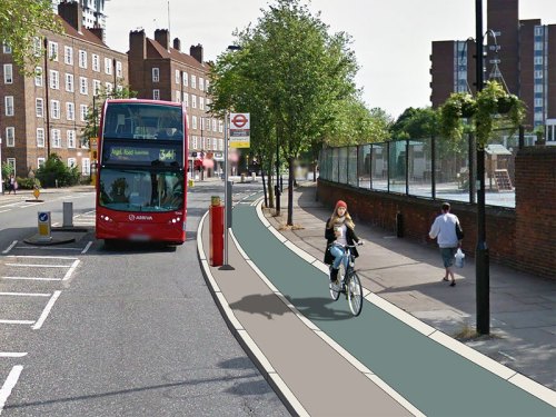 An alternative bus stop design, the likes of which are being suggested by TfL. The bus stops in the carriageway next to a 'bus stop island' allowing bike users to continue without having to overtake the bus.