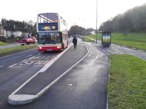 A bus-stop cycle bypass in Brighton. The bus stop is on a pedestrian island between the cycle path and the road.