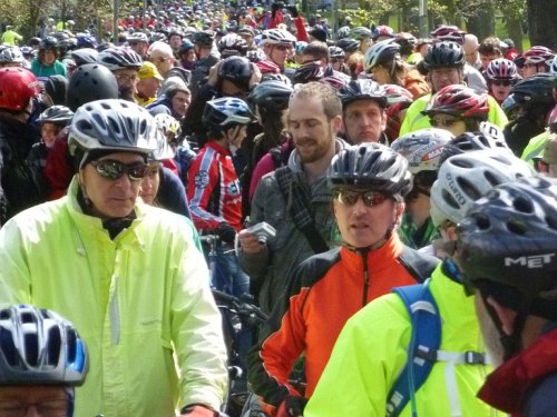 Pedal on Parliament rally, 2012 in Edinburgh. Thousands of riders, many of them wearing sporting clothing or high-visibility clothing.