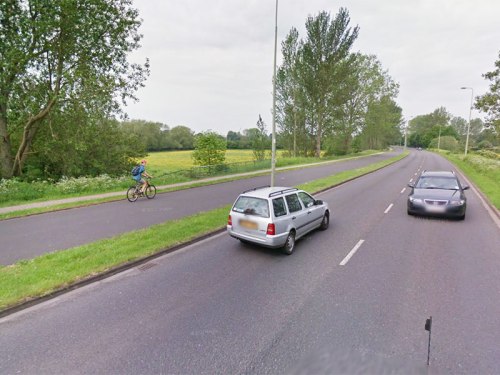 A photo of the Marston Ferry Road cycle path, showing a very wide, physically separate cycle path.