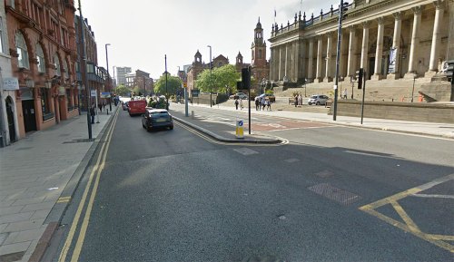 The very wide Headrow in front of Leeds Town Hall, with no pedestrian crossing