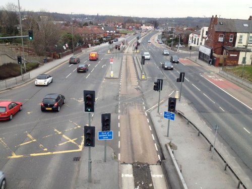 Photo taken from footbridge over York Road in Leeds, facing east, looking over eight lanes for motor traffic (two of them bus lanes)